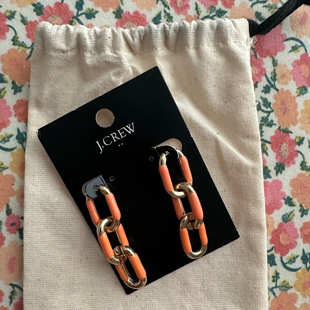 Cute orange link earrings!Can also be unlinked to use as single hoop/Huggie. NWT